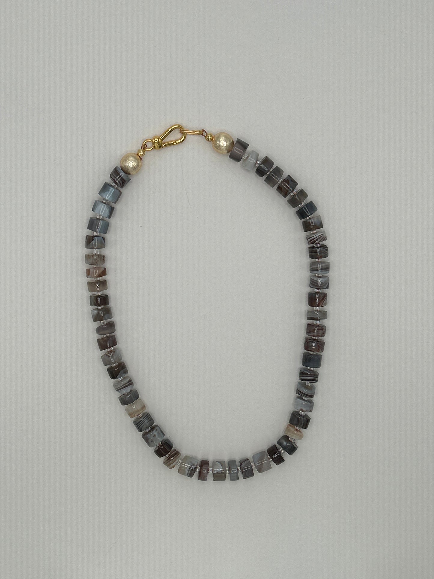 Meridian: cylindrical browns and greys