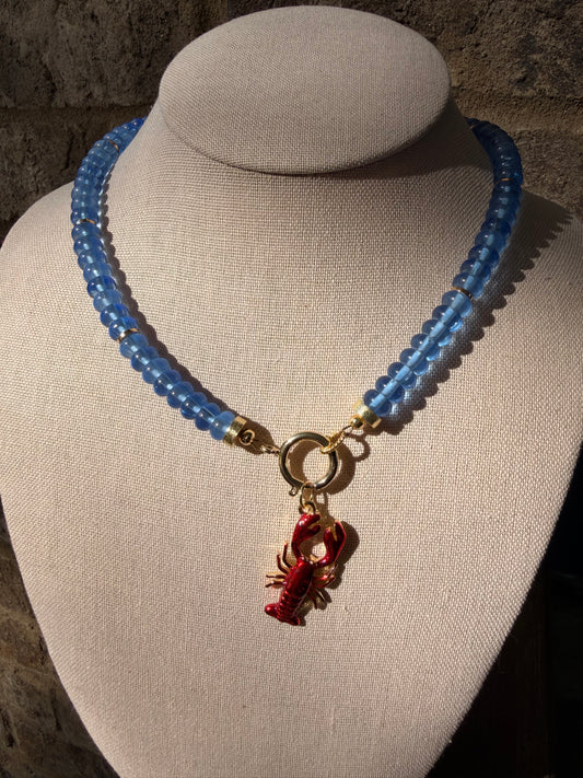 American: blue rondelle beads with a removable lobster charm