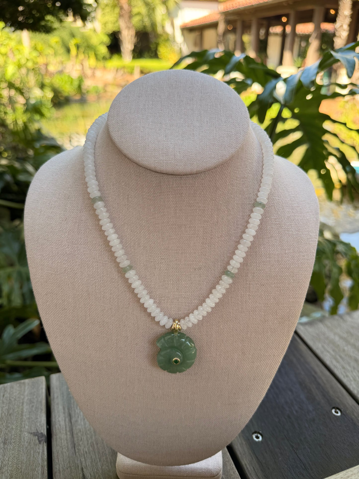 Flock: white with green nautilus shell