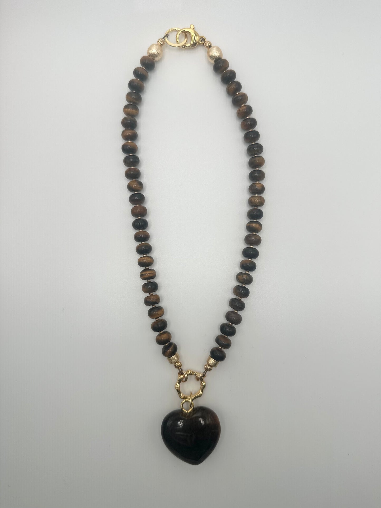 Flock: tigers eye with tigers eye heart pendant