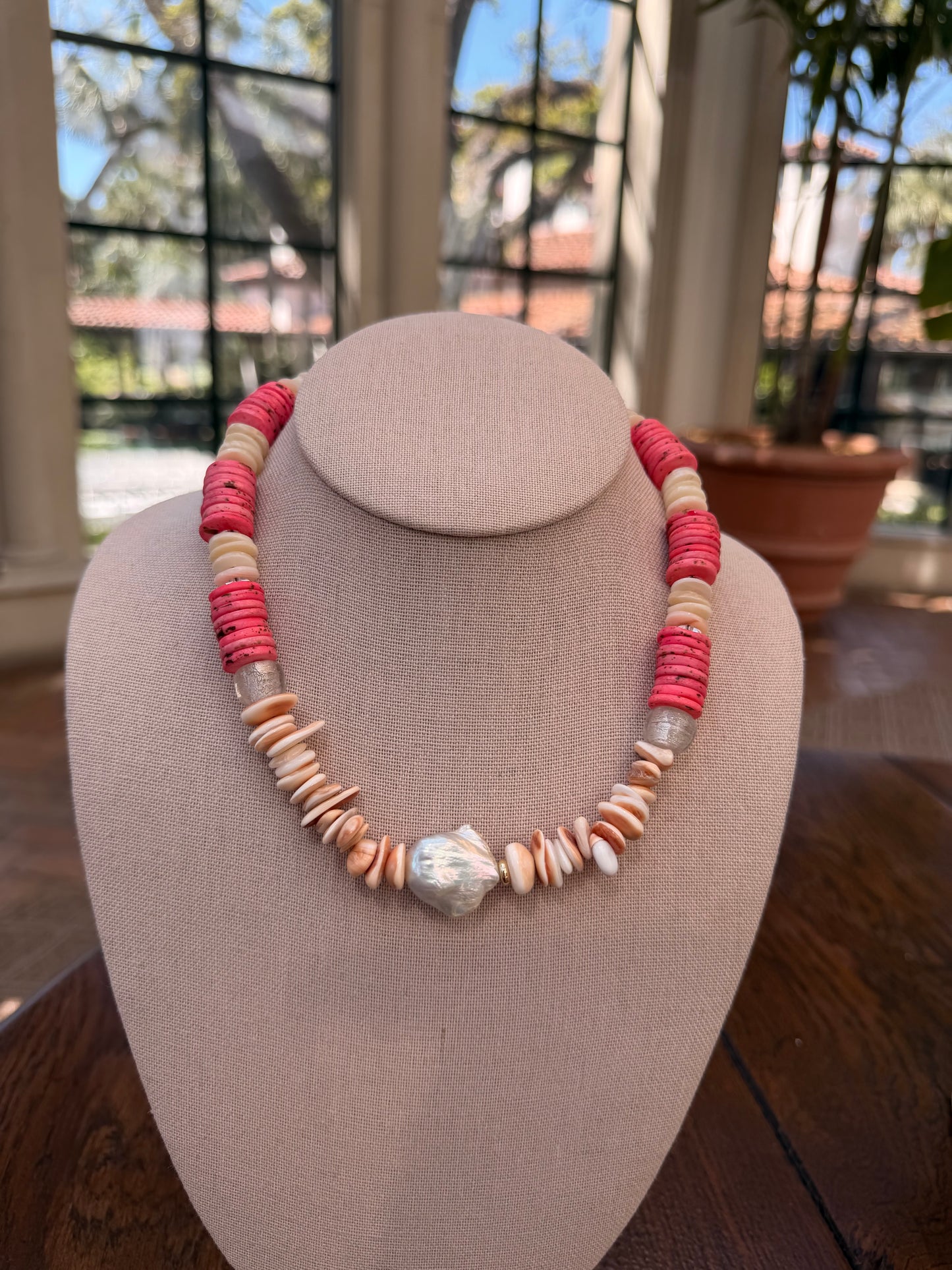 Beachy: shells, pink coins, and baroque pearl