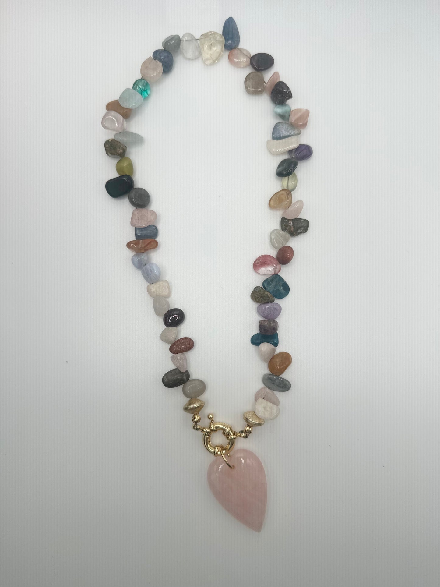 The Quarry: multi colored stones with pink heart pendant