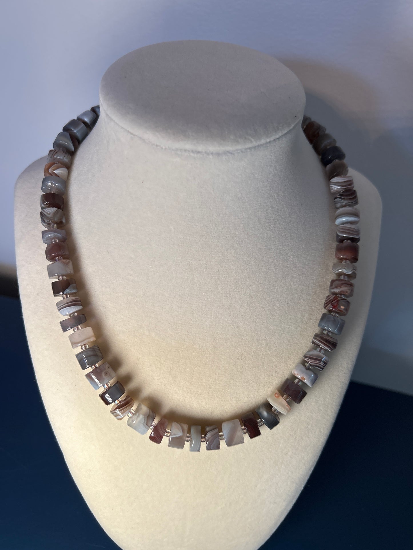 Meridian: cylindrical browns and greys