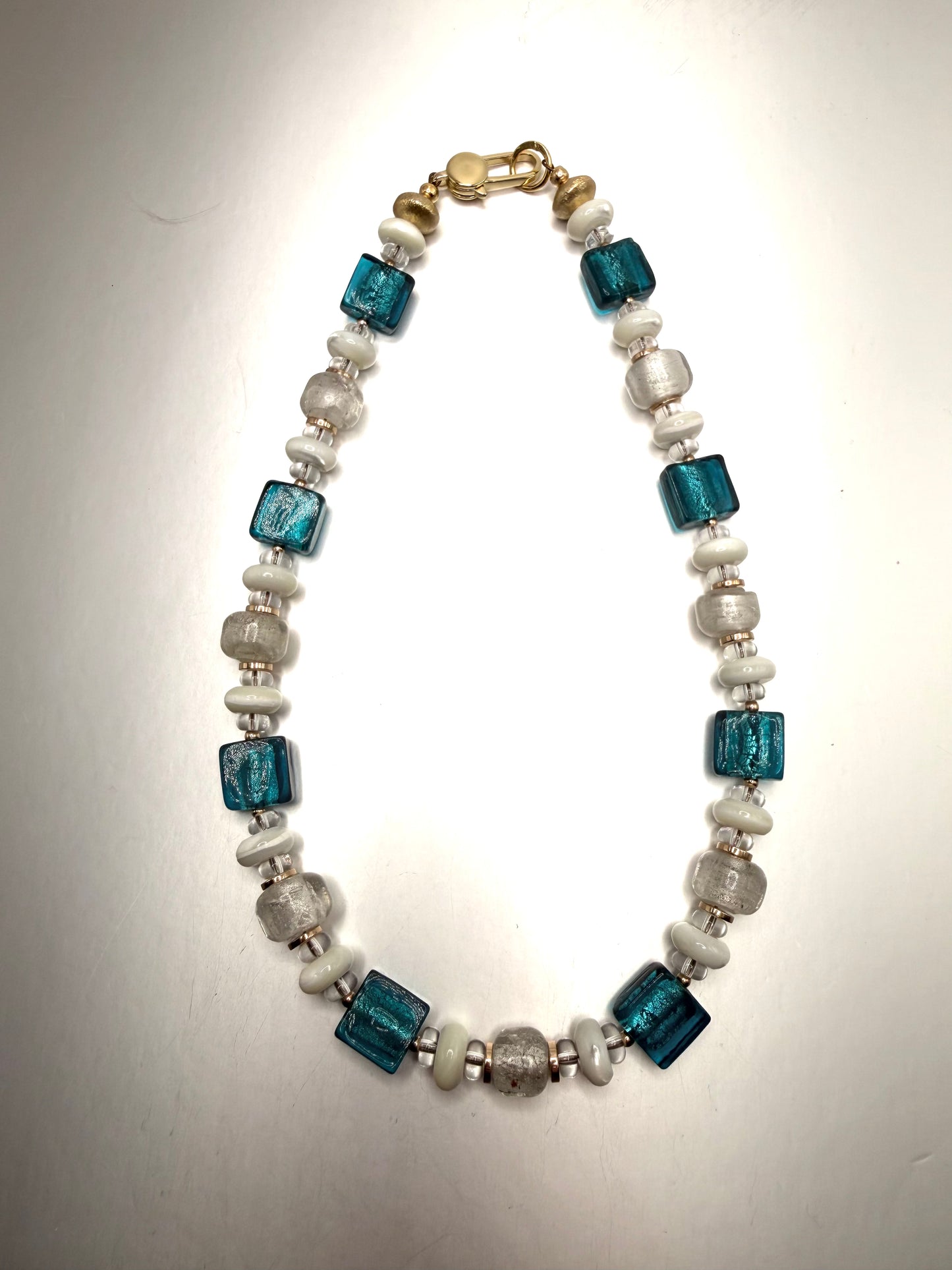 Wild nest: dark teal with frosted white beads