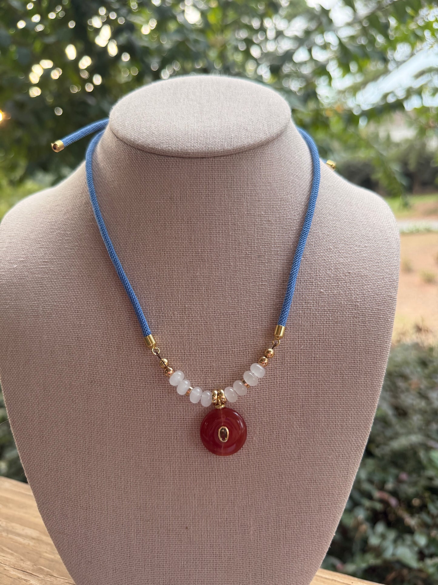 Game Day🏈: adjustable blue cord with orange pendant