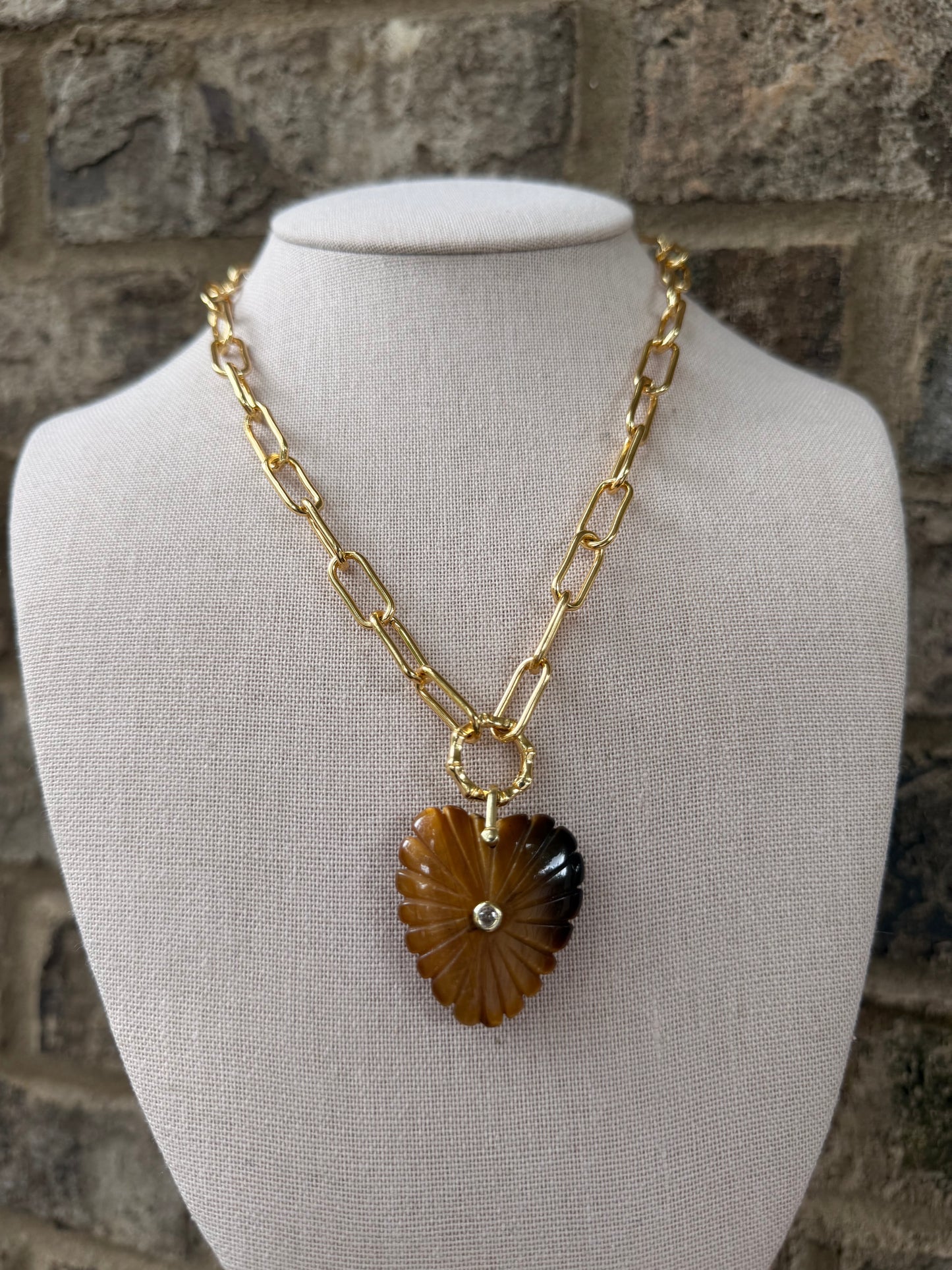 Gold chain with tiger’s eye heart pendant