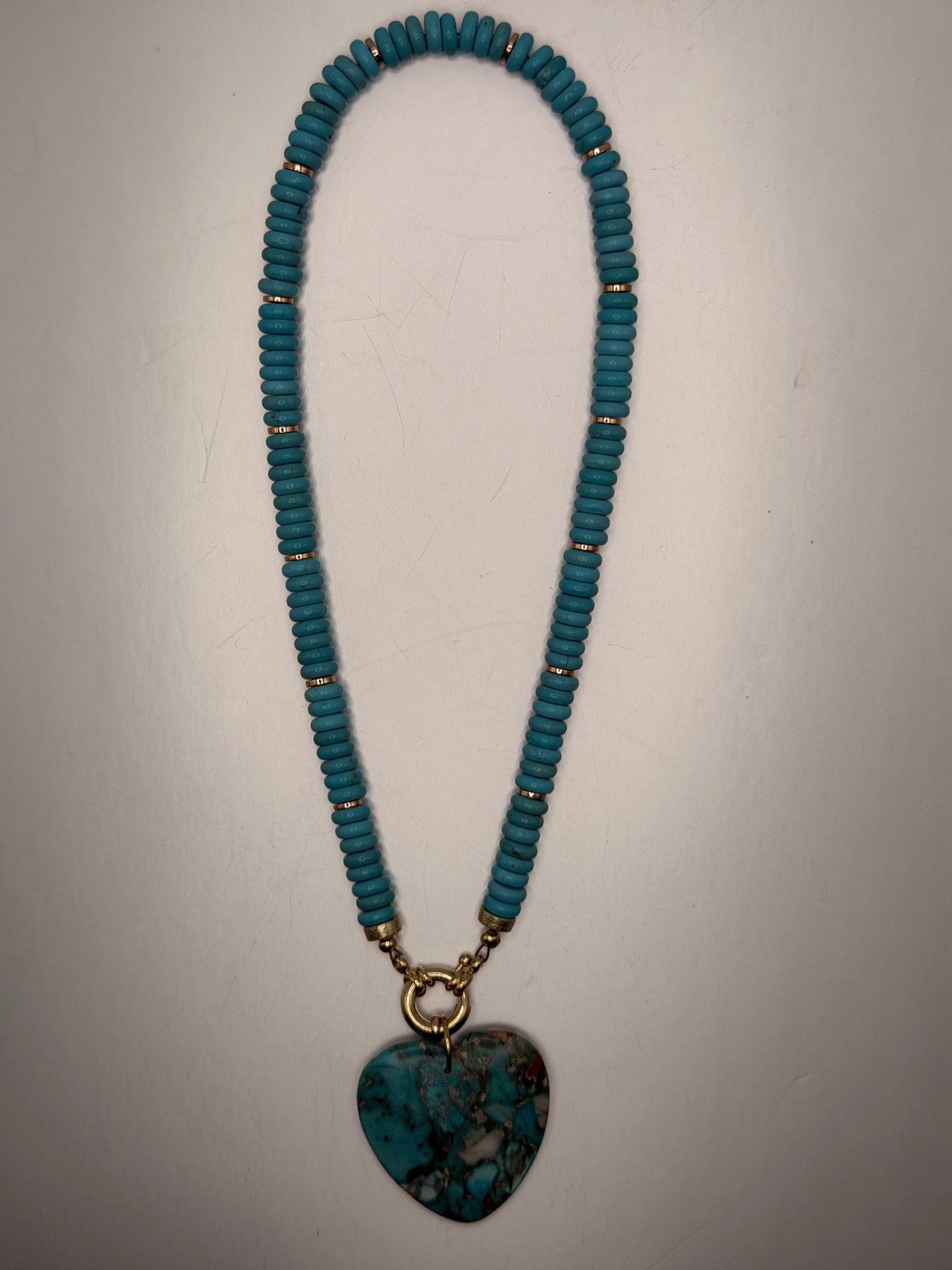 Flock: turquoise beads with matching heart pendant