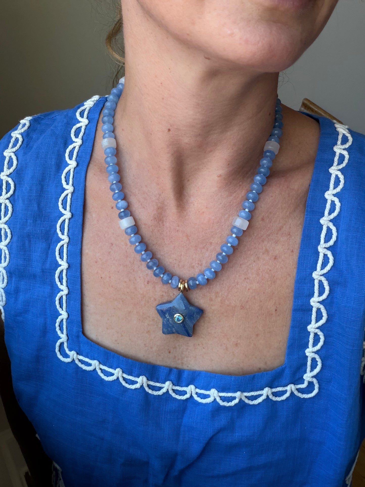 American: blue and white beads with a blue start pendant