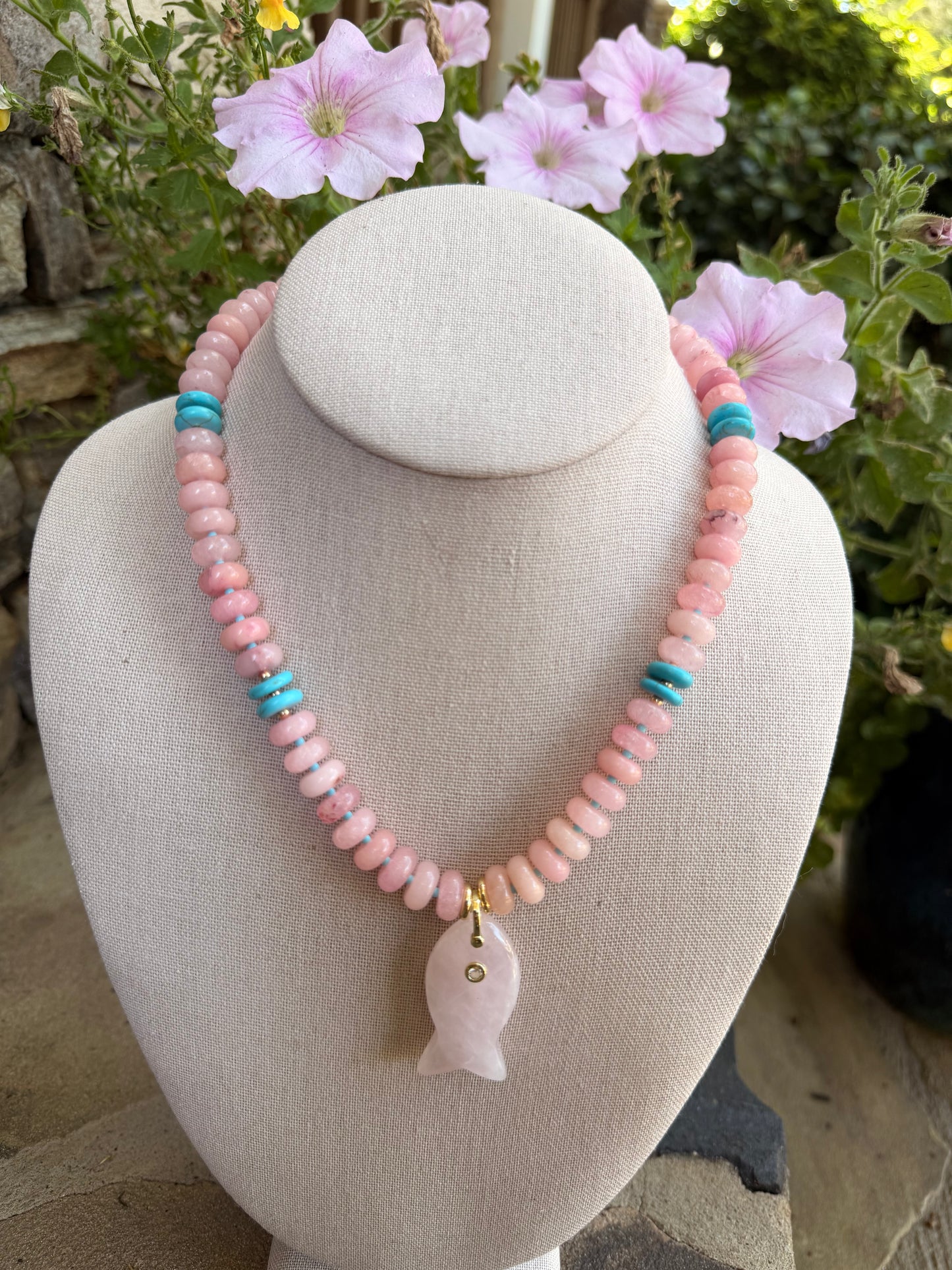 Beachy: pink and turquoise with a light pink fish pendant