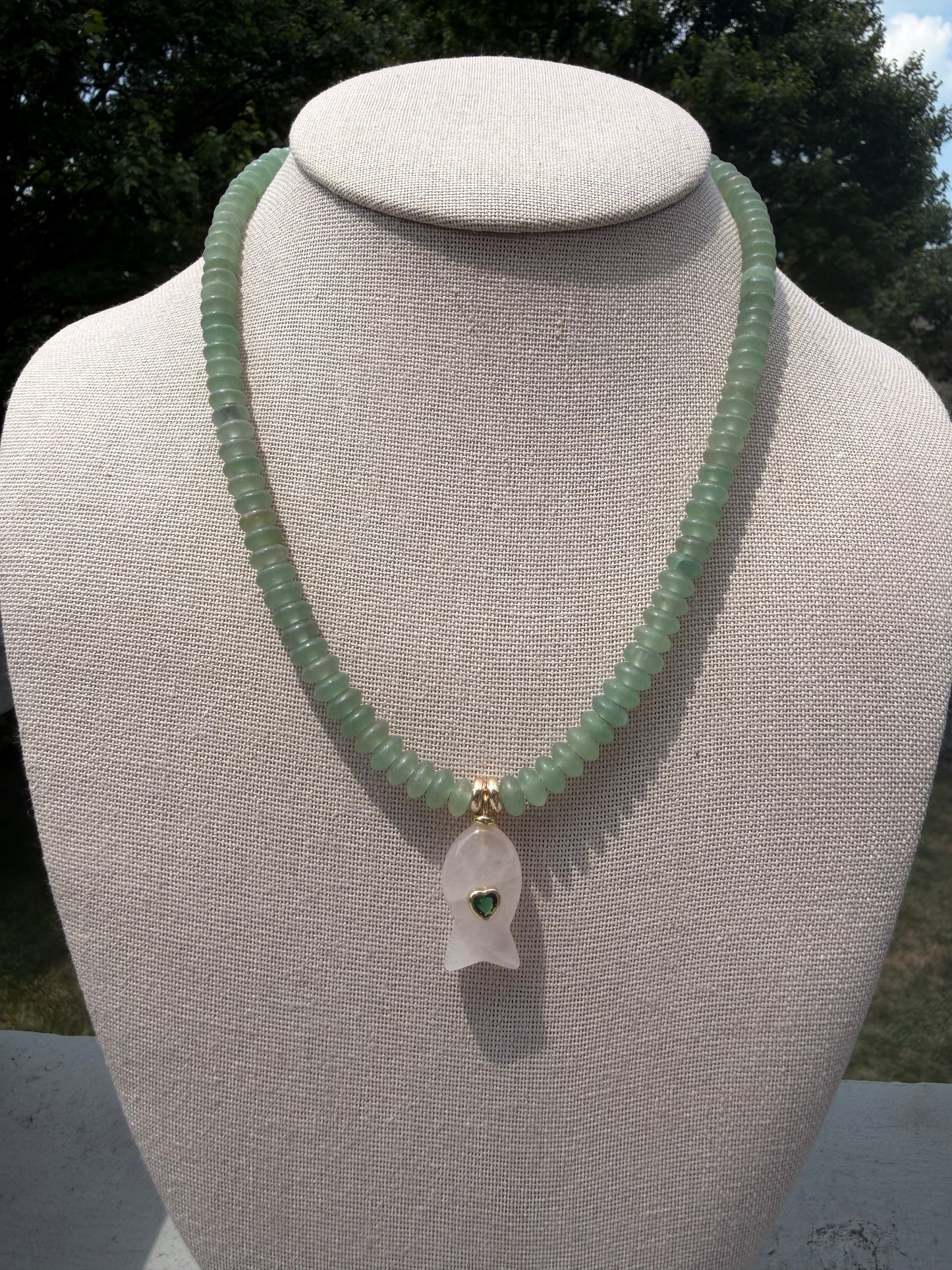 Flock: mini fish, green with a light pink fish