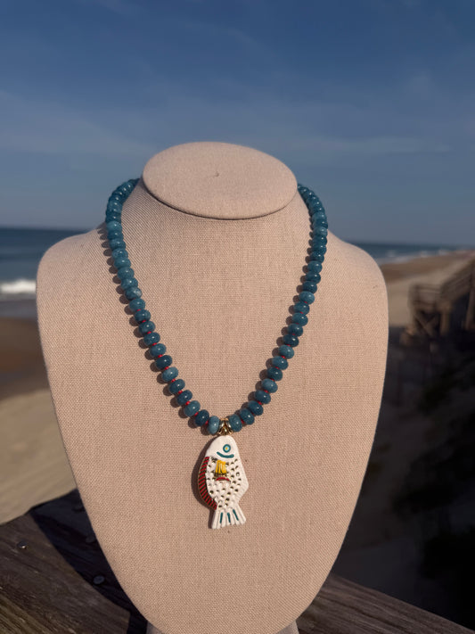 Fish: blue beads with white fish pendant