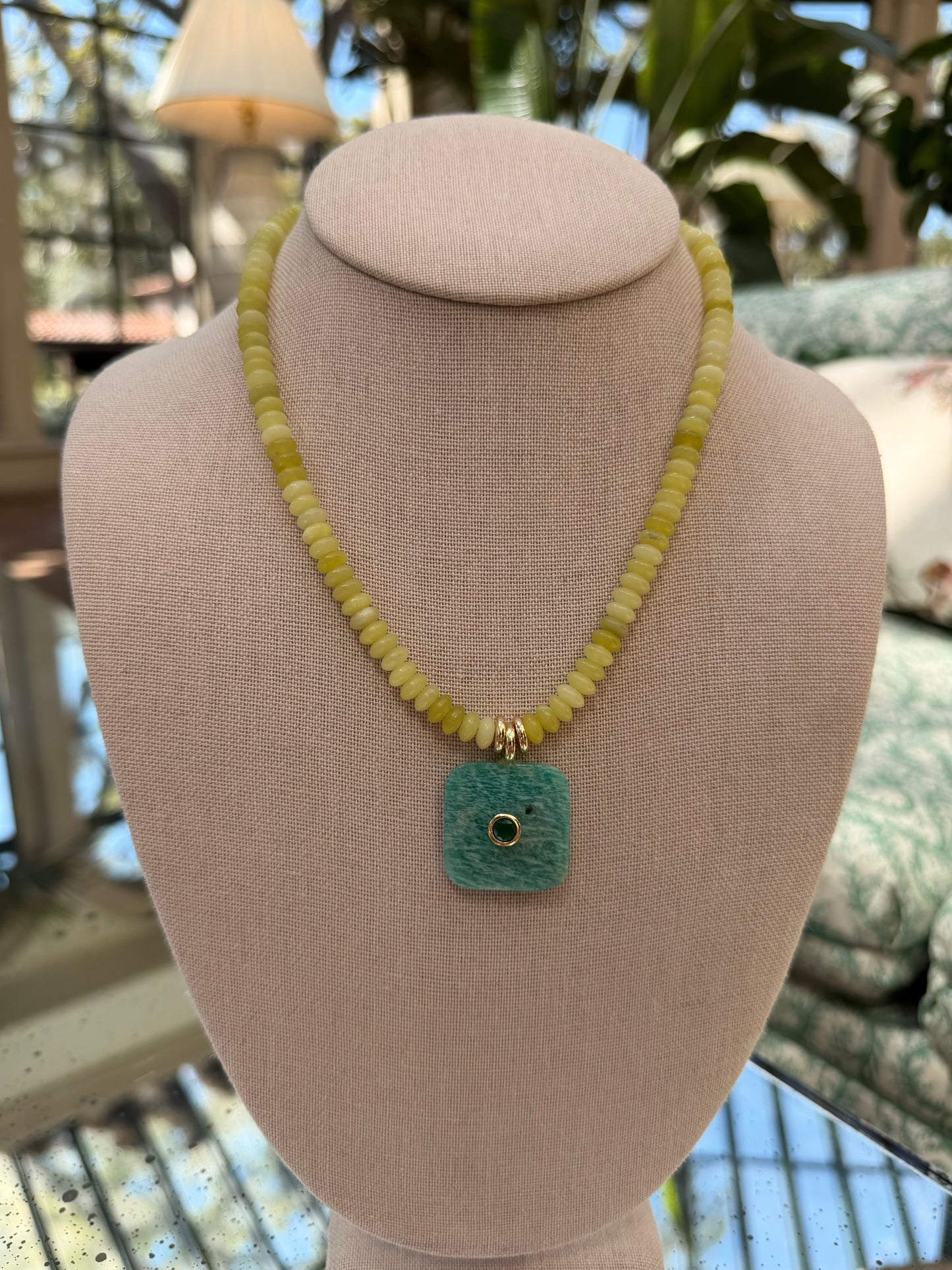 Flock: saucer beads with a square pendant