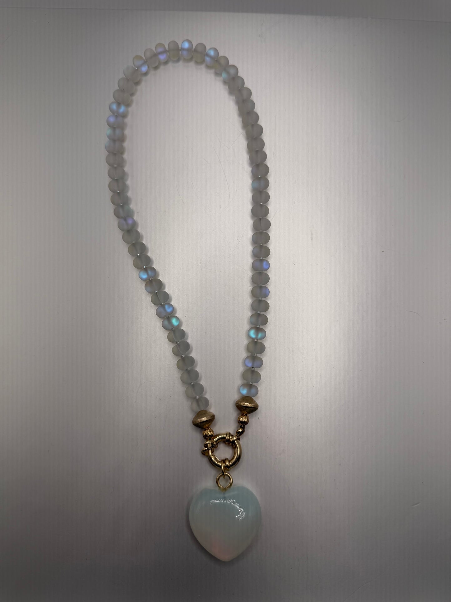 Flock: Frosty white iridescent beads with a matching heart pendant