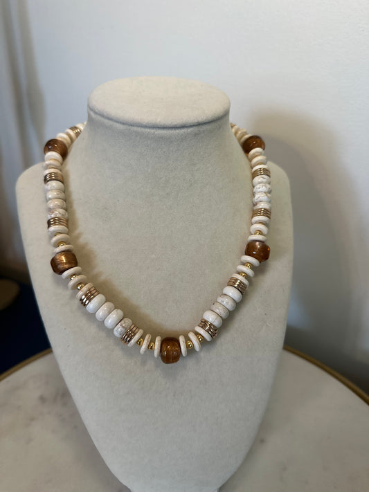 Meridian: creams, gold, and bronze