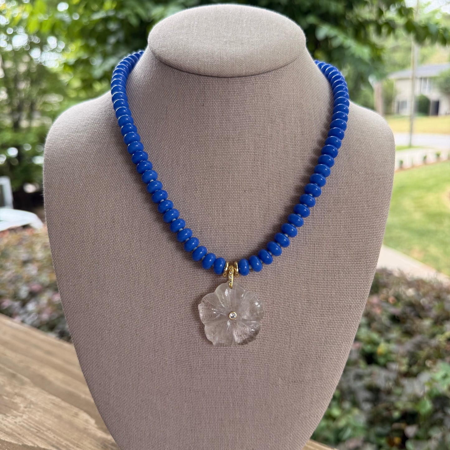 Flock: cornflower blue with a translucent flower pendant