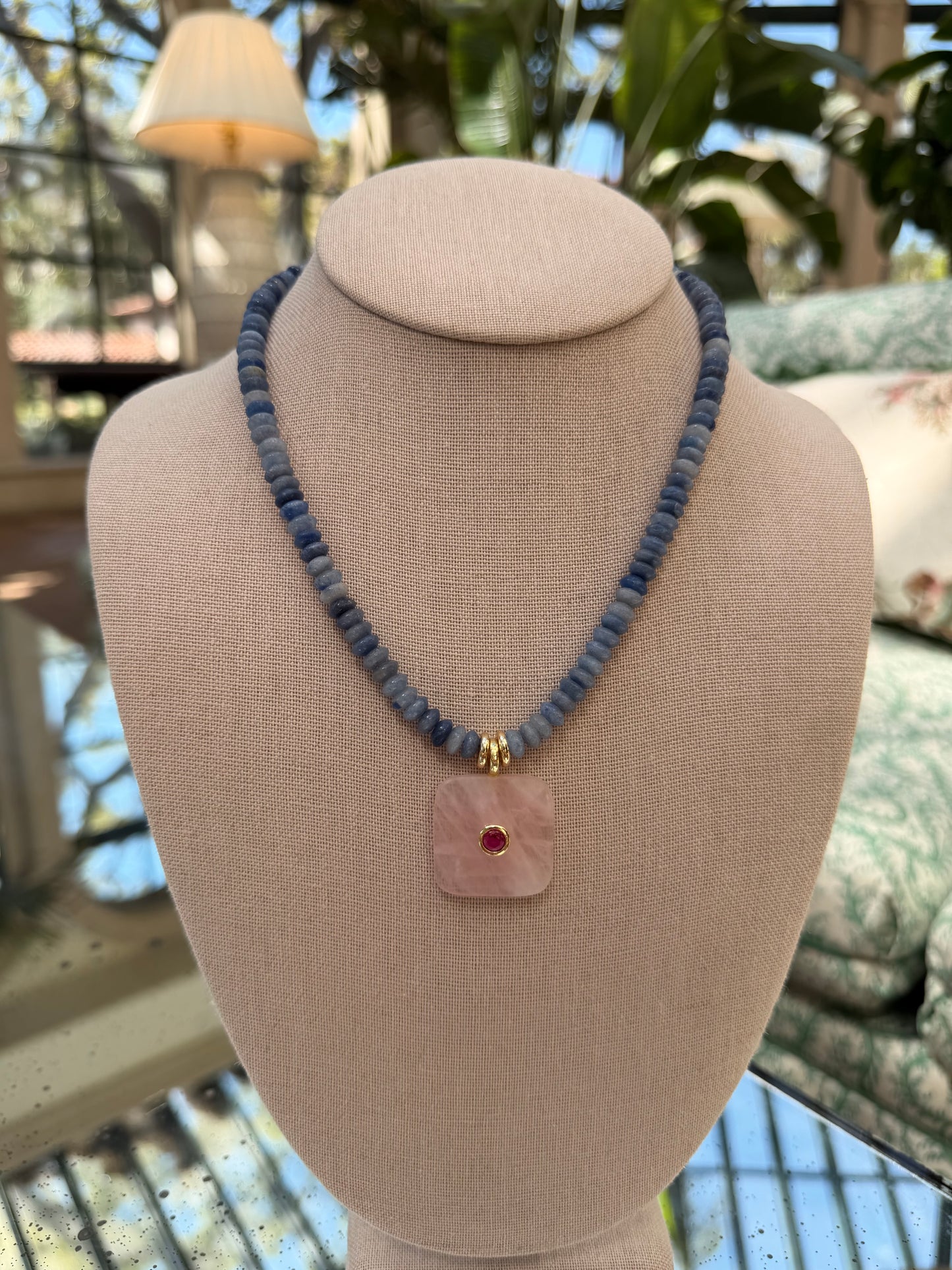 Flock: saucer beads with a square pendant