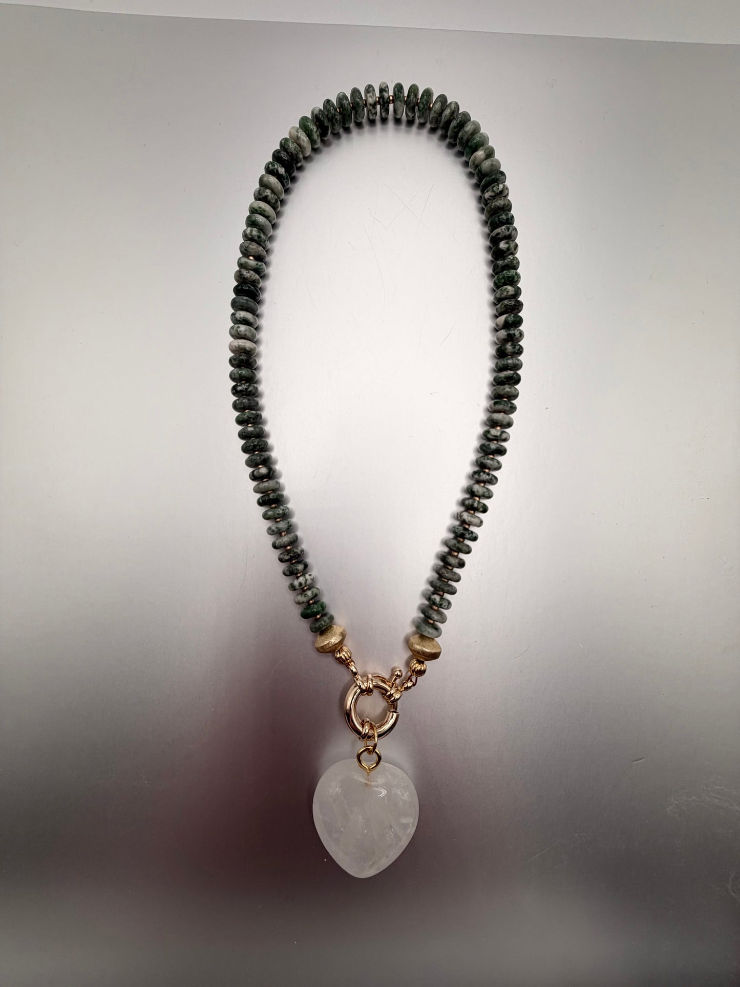 Flock: green and white stones with a translucent white heart pendant