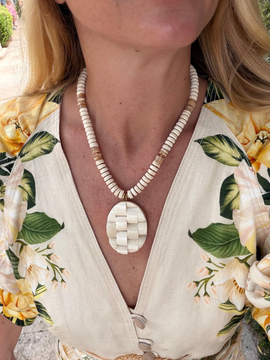 Beachy: cream and shells with a woven textured pendant
