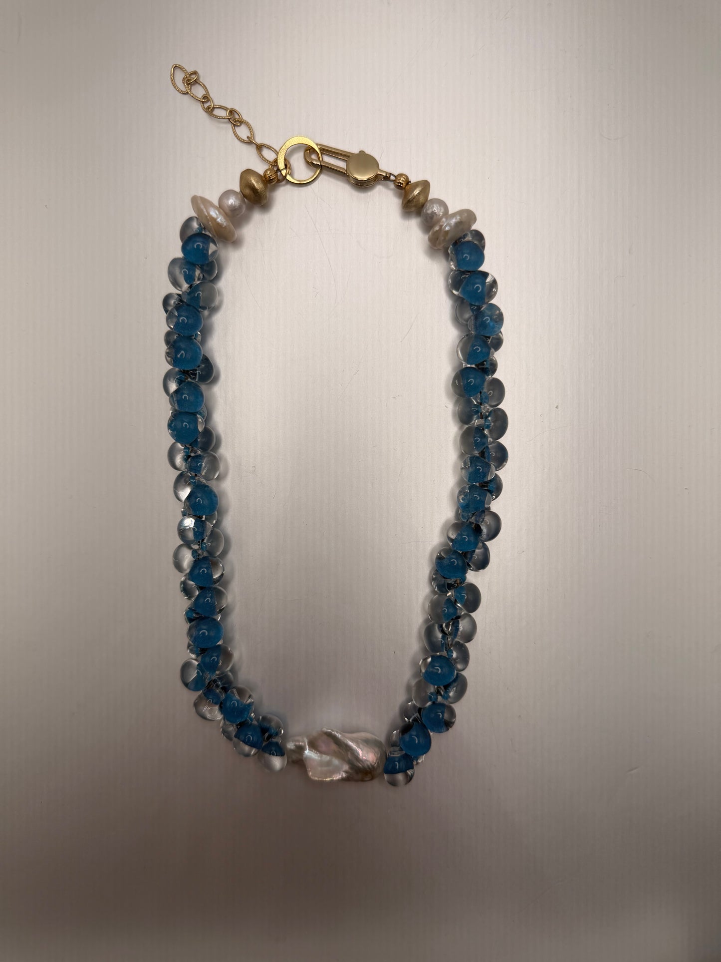 Radiance: blue and clear hand blown glass beads with a baroque pearl