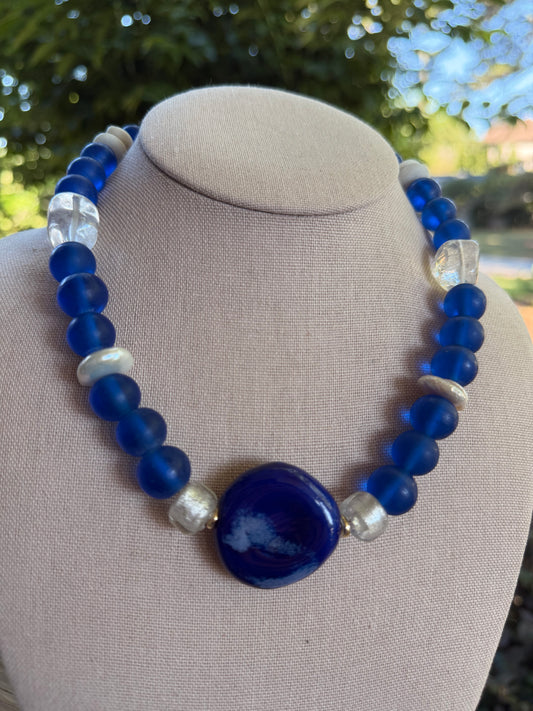 American: blue, clear, and white with blue center stone