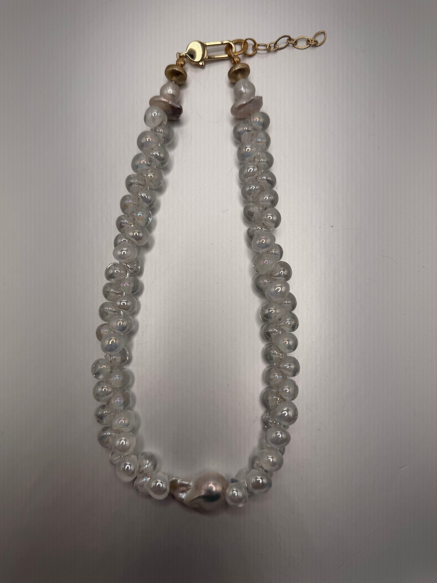 Radiance: white and clear iridescent, hand blown glass beads with a baroque pearl