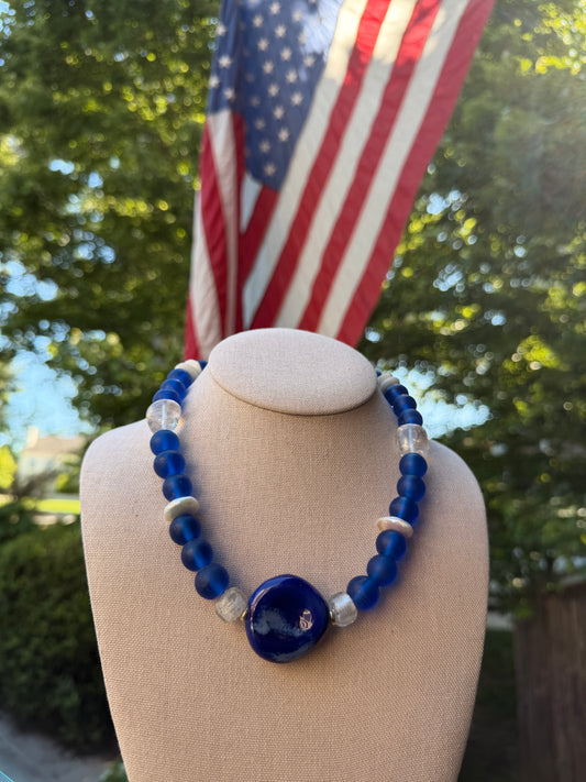 American: blue, clear, and white with blue center stone