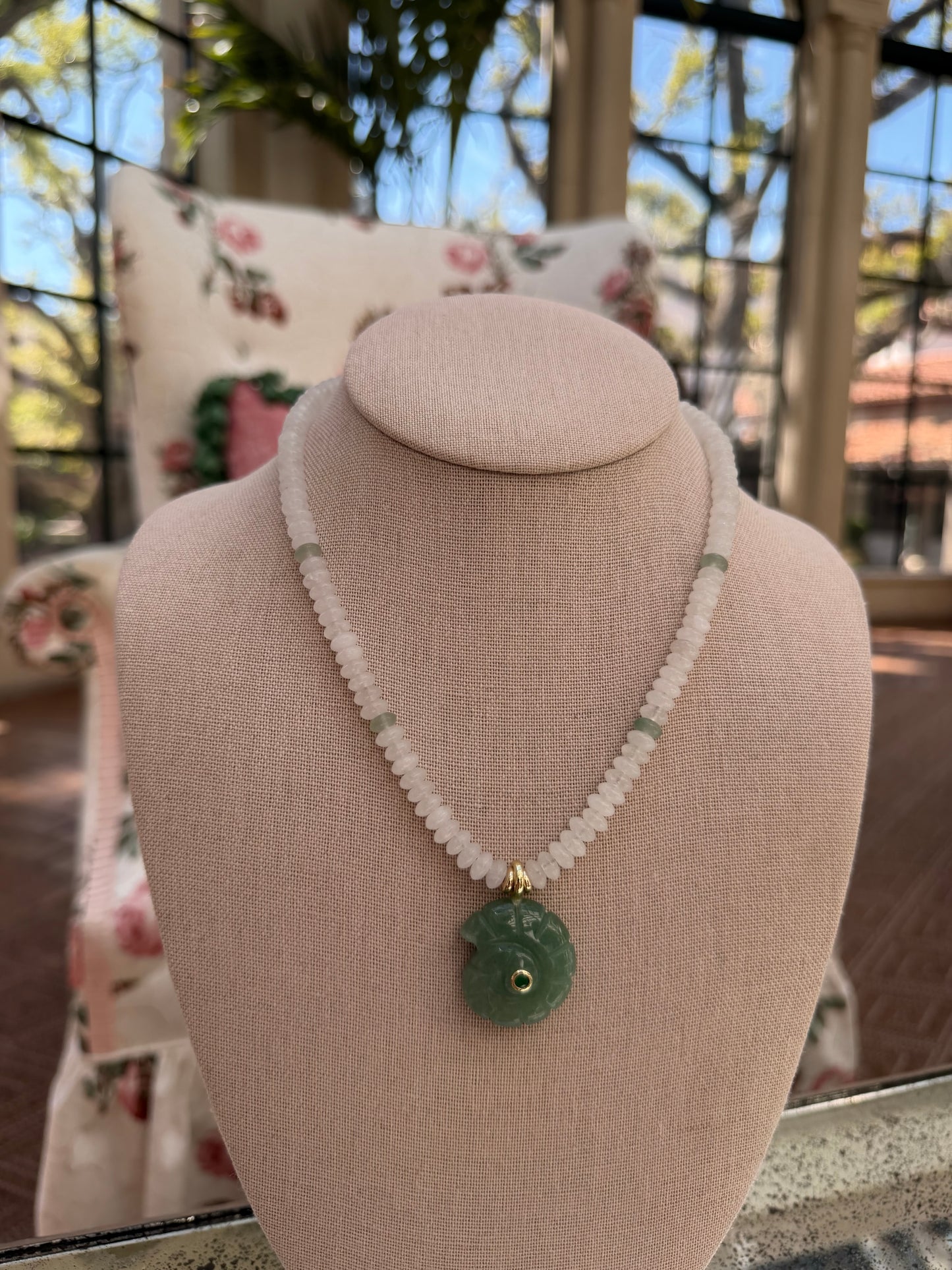 Flock: white with green nautilus shell