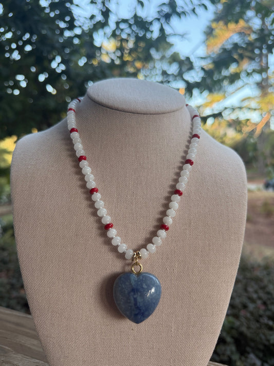 Game Day🏈:  white and red with blue heart pendant