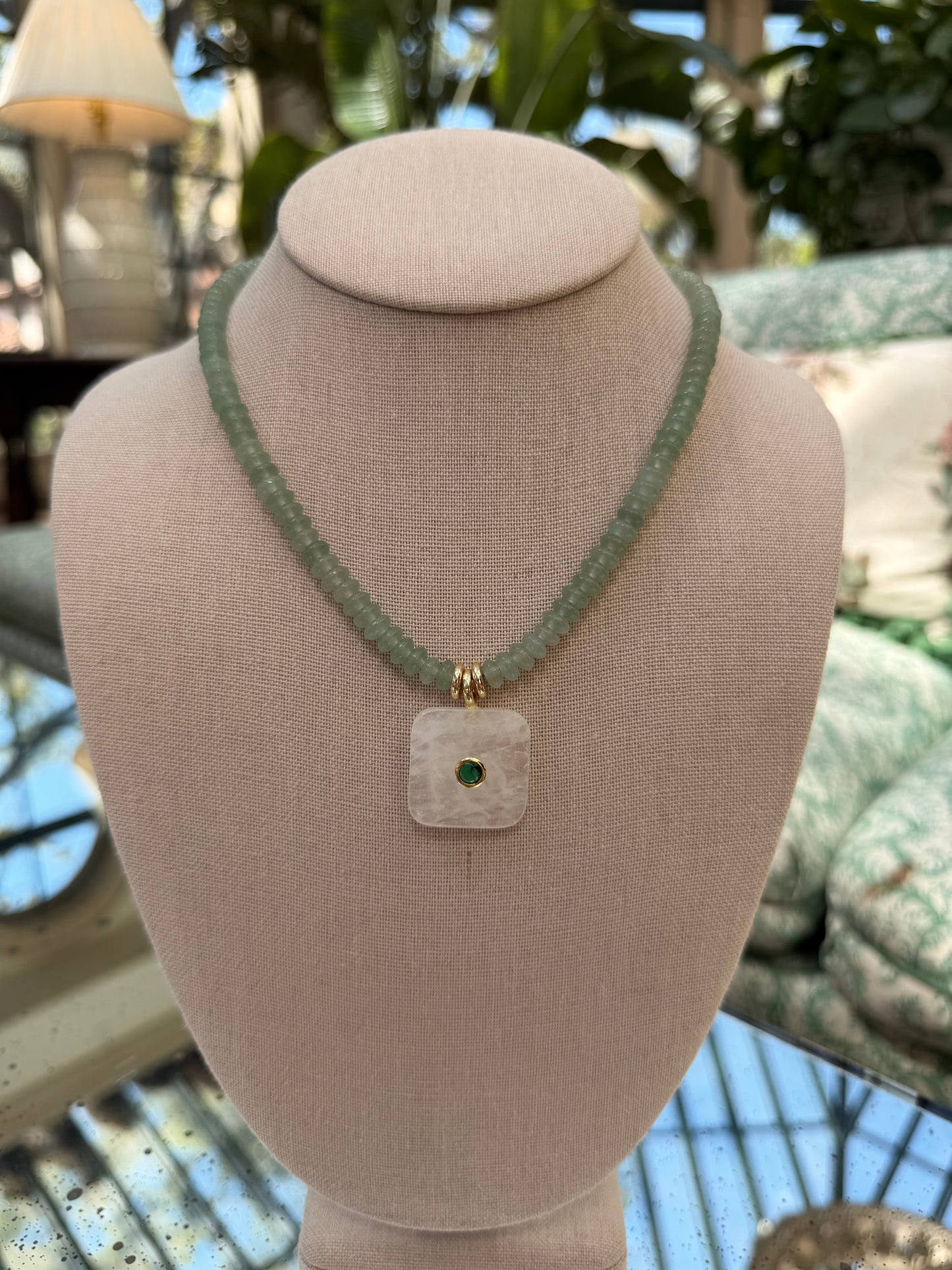 Flock: saucer beads with a square pendant