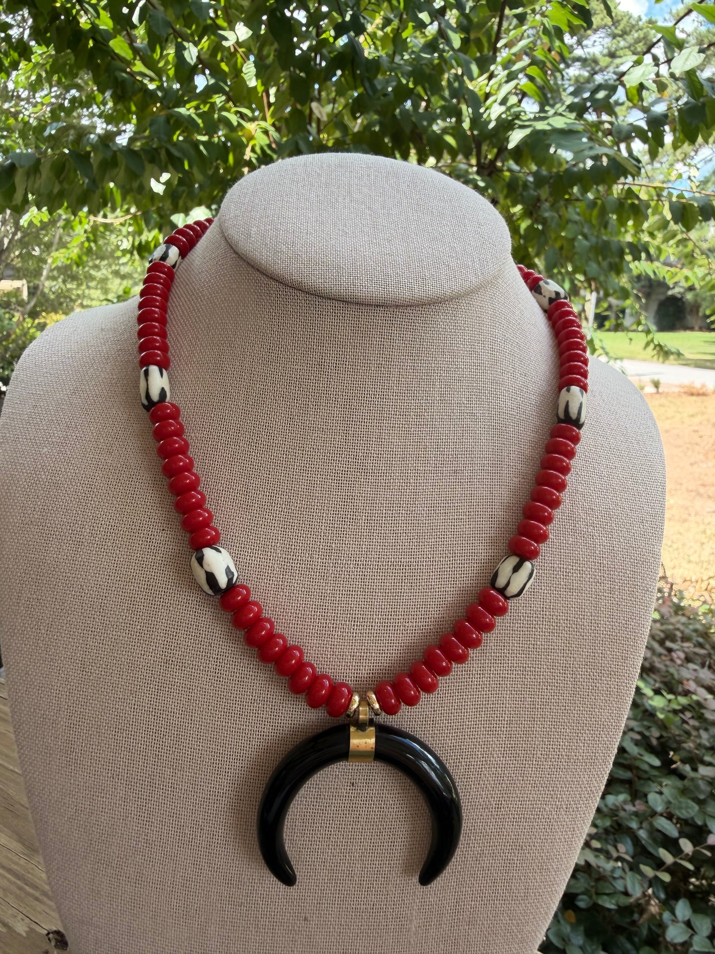 Game Day🏈: red beads with a black horn pendant