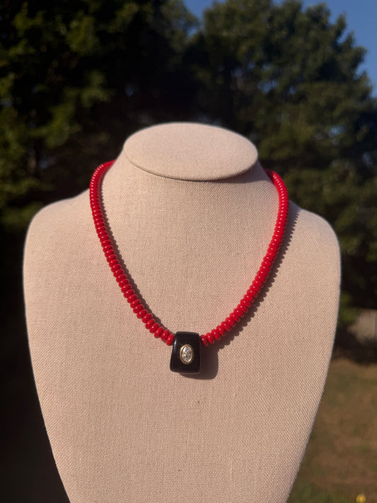 Game Day🏈: red beads with black pendant