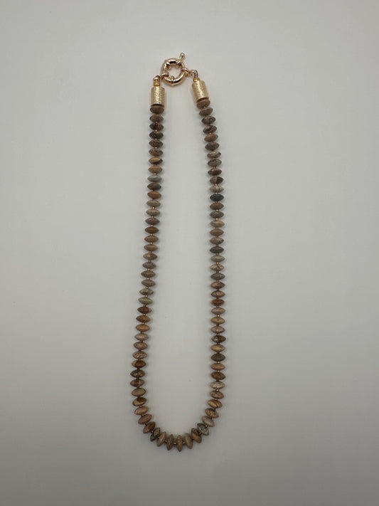 Flock: saucer shaped brown necklace