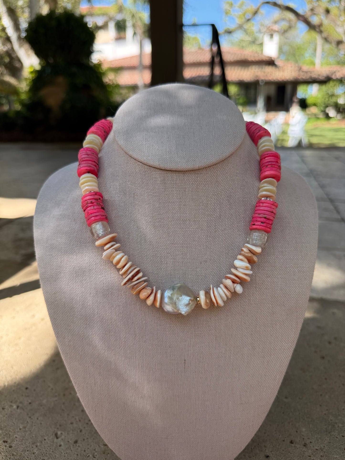 Beachy: shells, pink coins, and baroque pearl