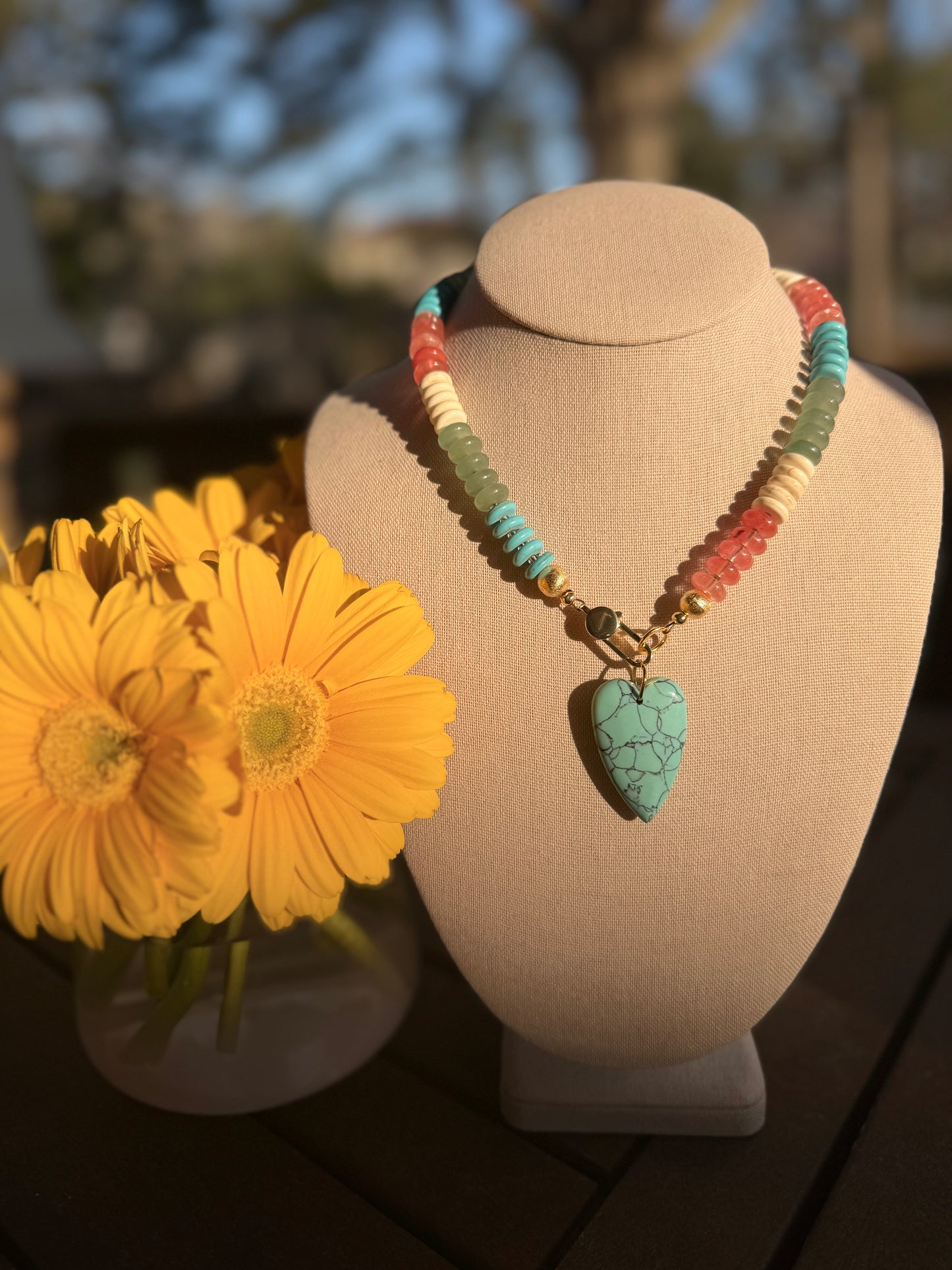 Flock: spring colors with turquoise heart pendant