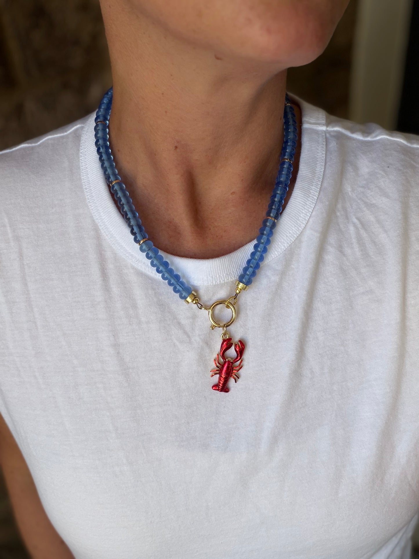 American: blue rondelle beads with a removable lobster charm