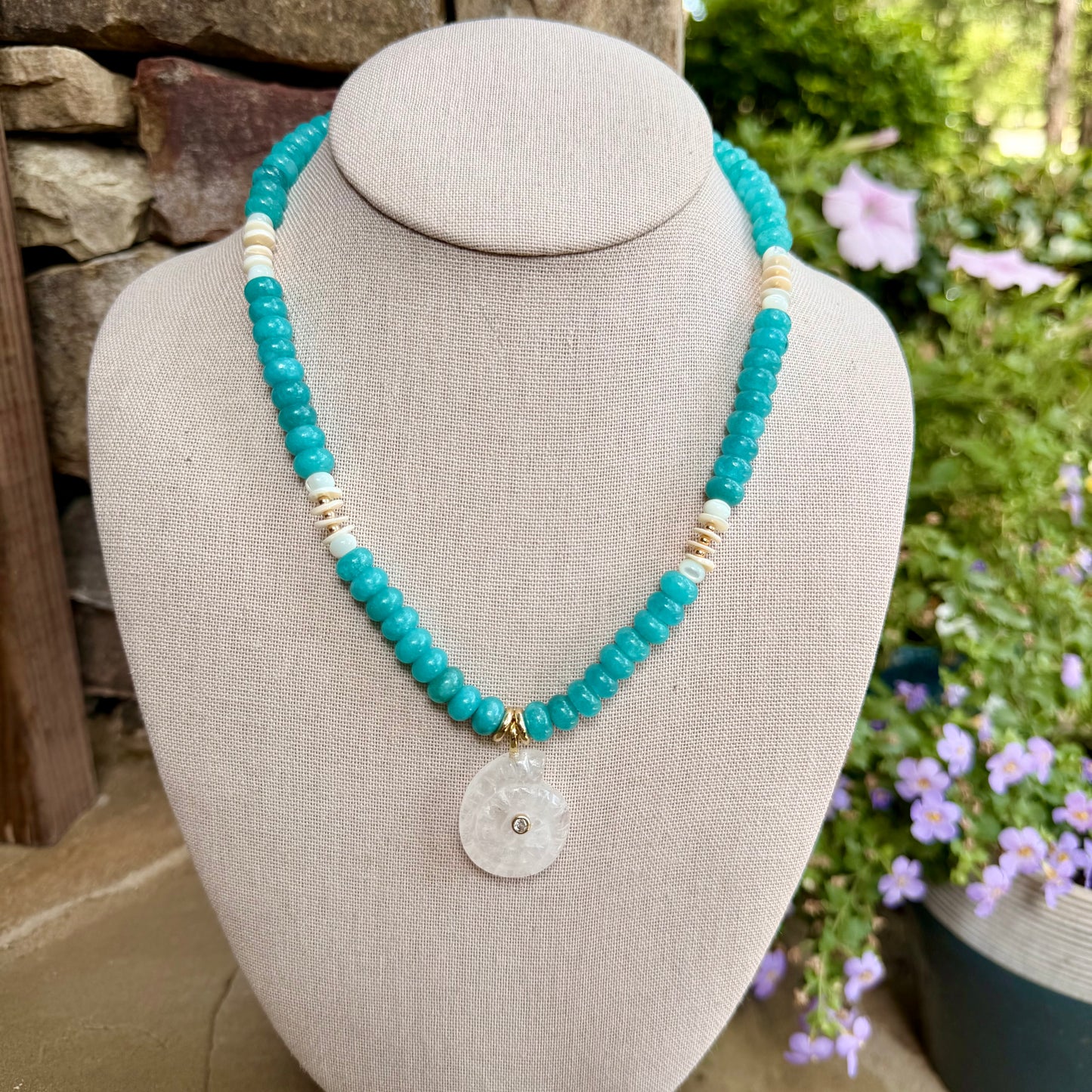 Beachy: rondelle beads with shells and a nautilus shell pendant