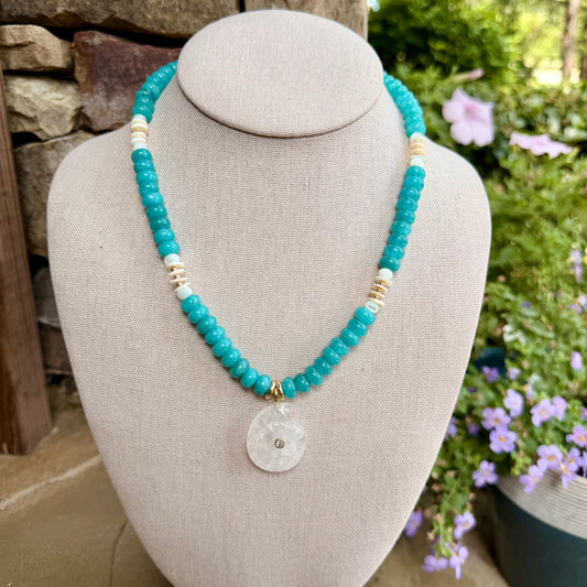 Beachy: rondelle beads with shells and a nautilus shell pendant