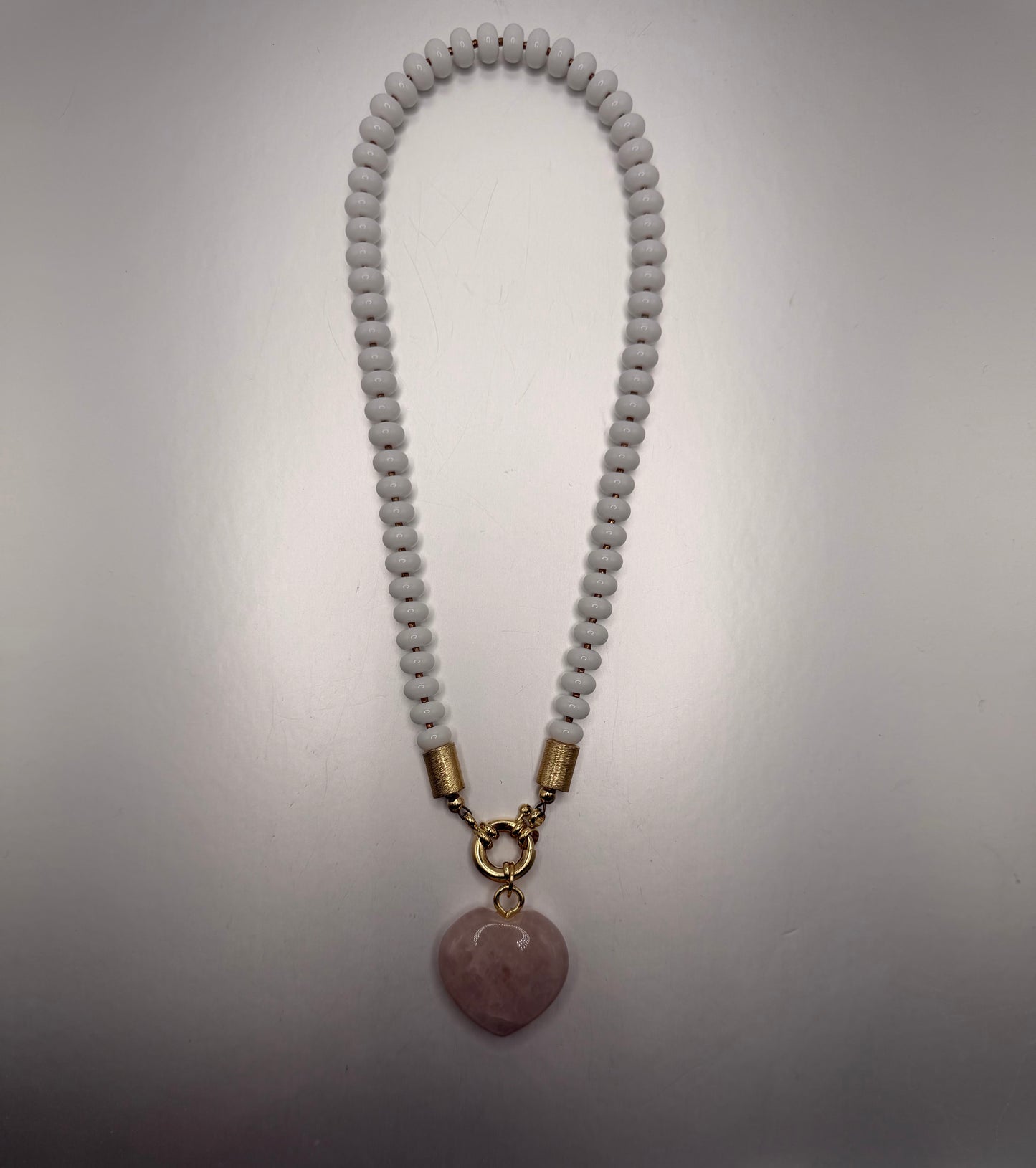 Flock: white with pink heart pendant