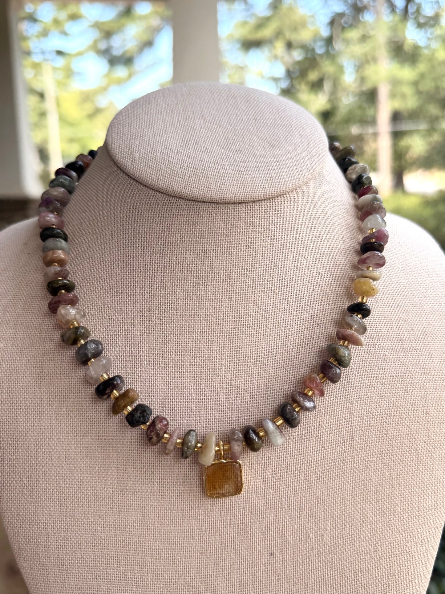 Quarry: Tourmaline with a citrine pendant