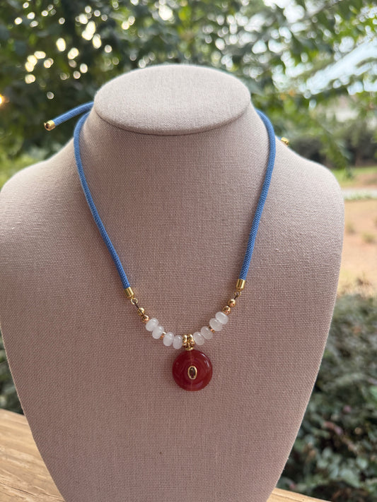 Game Day🏈: adjustable blue cord with orange pendant