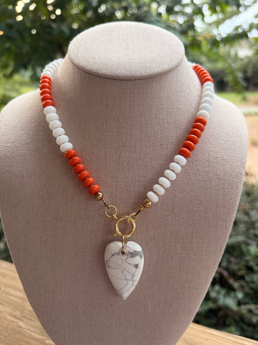 Game Day🏈: Orange and white with a white heart pendant