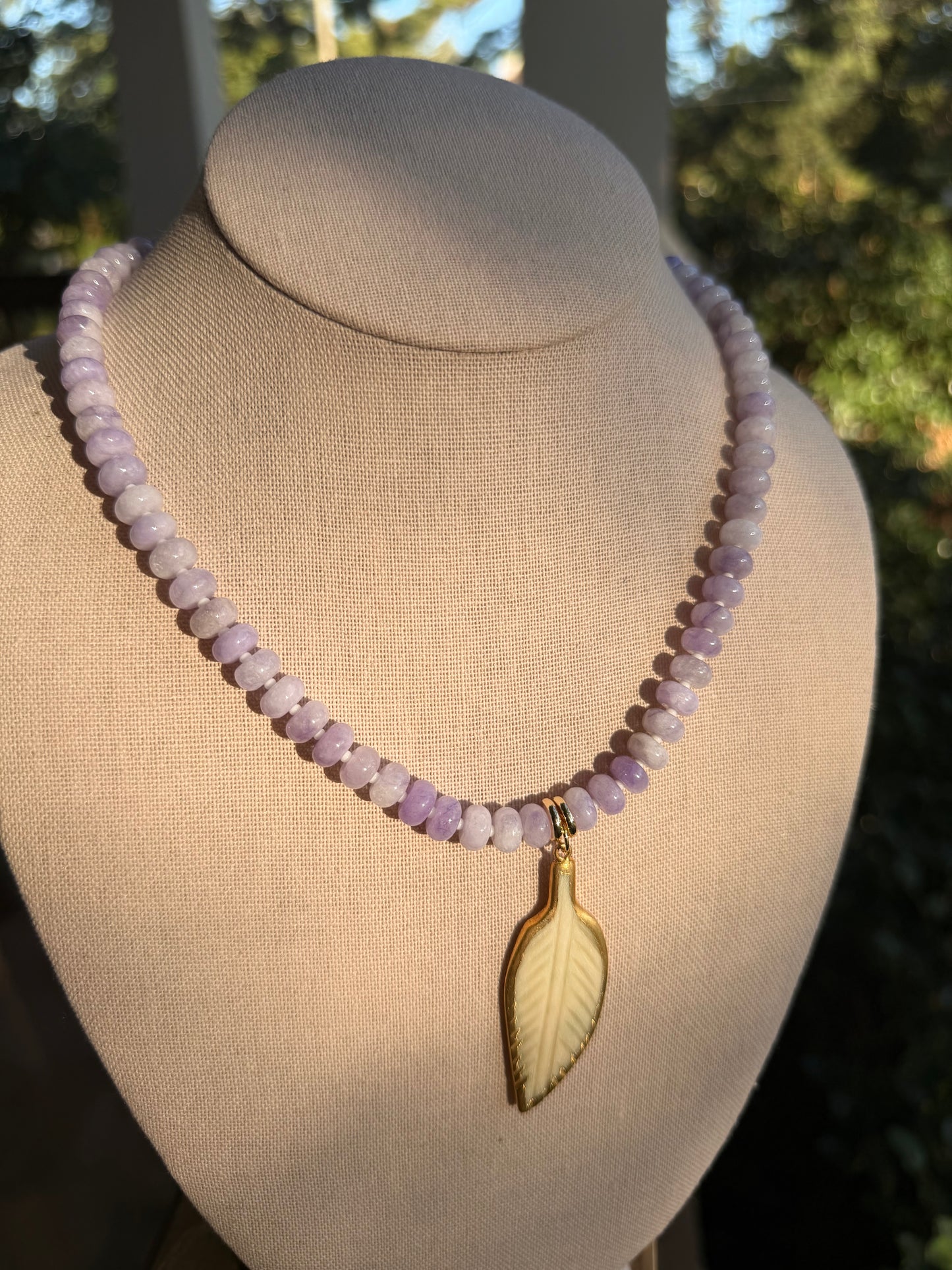 Game Day🏈: light purple with a feather pendant