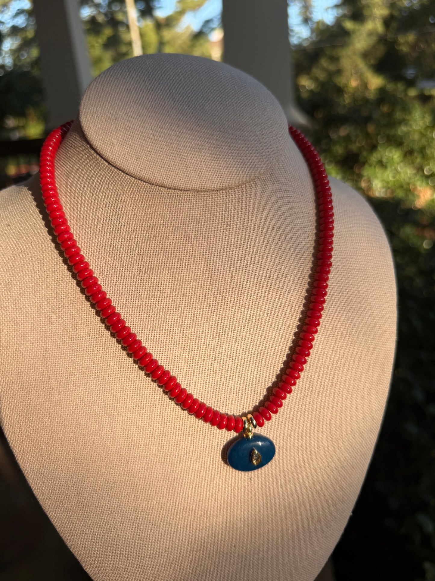 Game Day🏈: red with a blue pendant