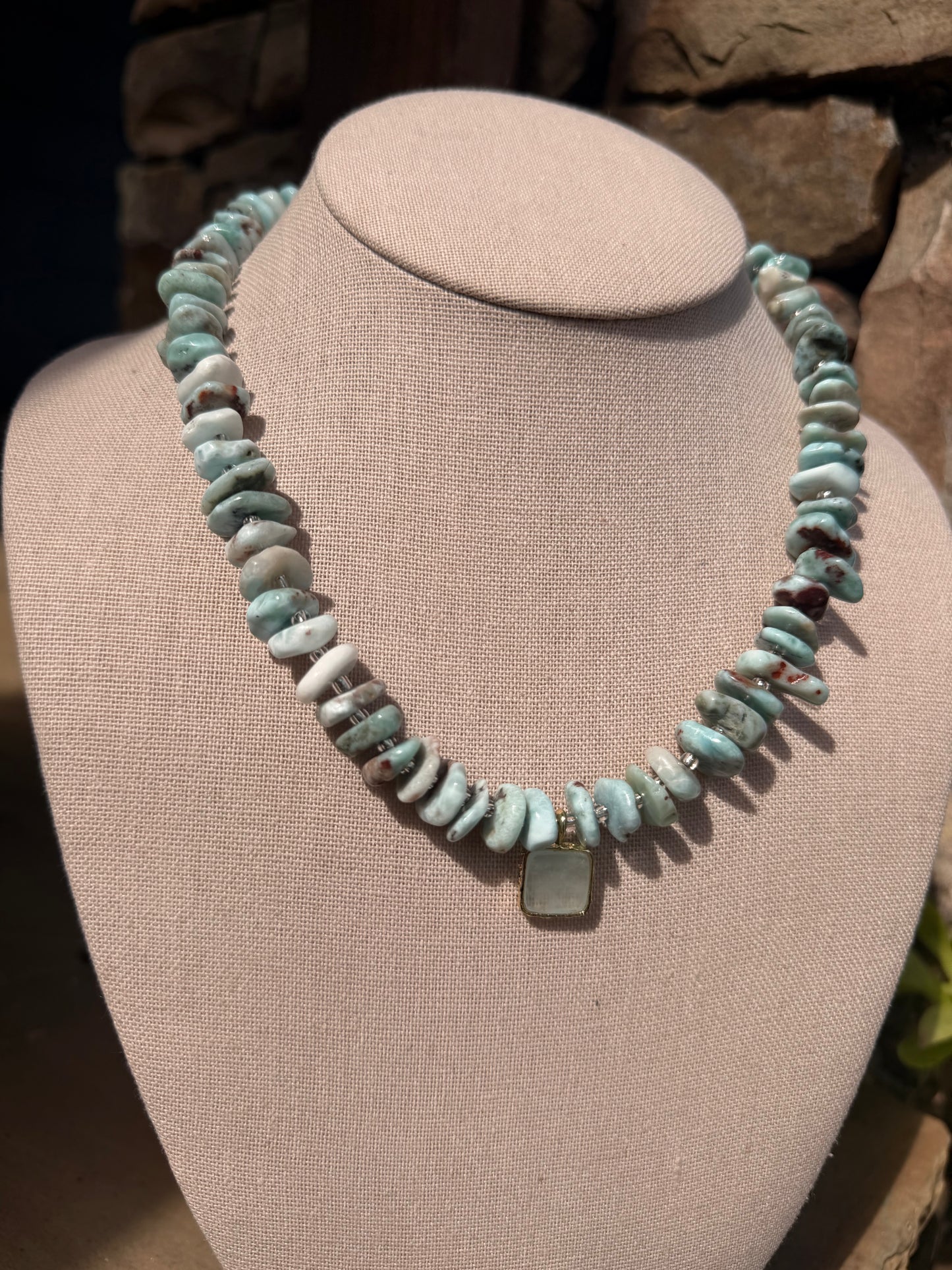 Quarry: Larimar stones with a blue celadon pendant