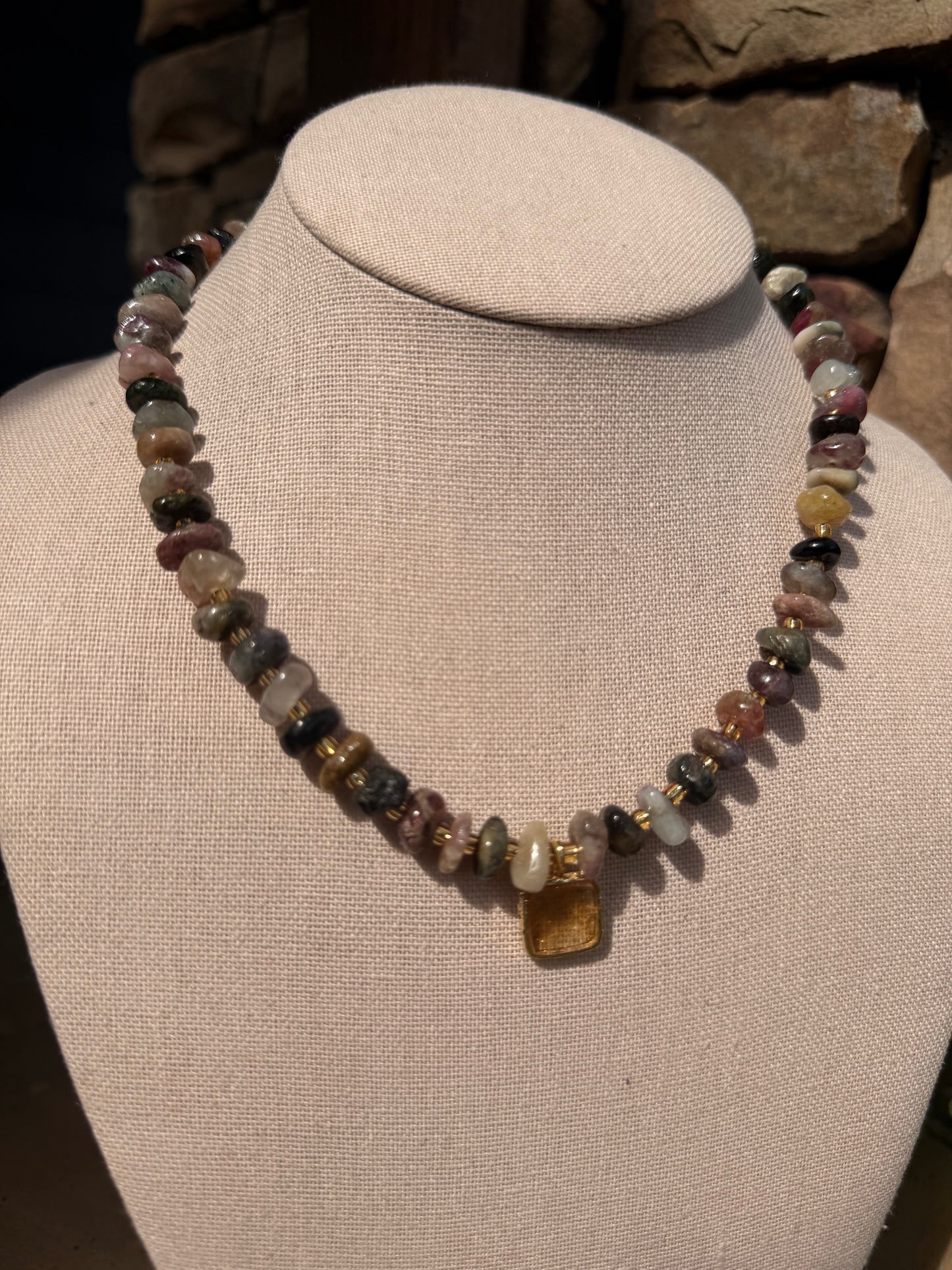 Quarry: Tourmaline with a citrine pendant