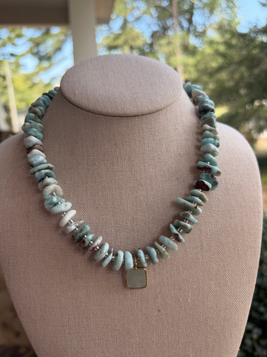 Quarry: Larimar stones with a blue celadon pendant