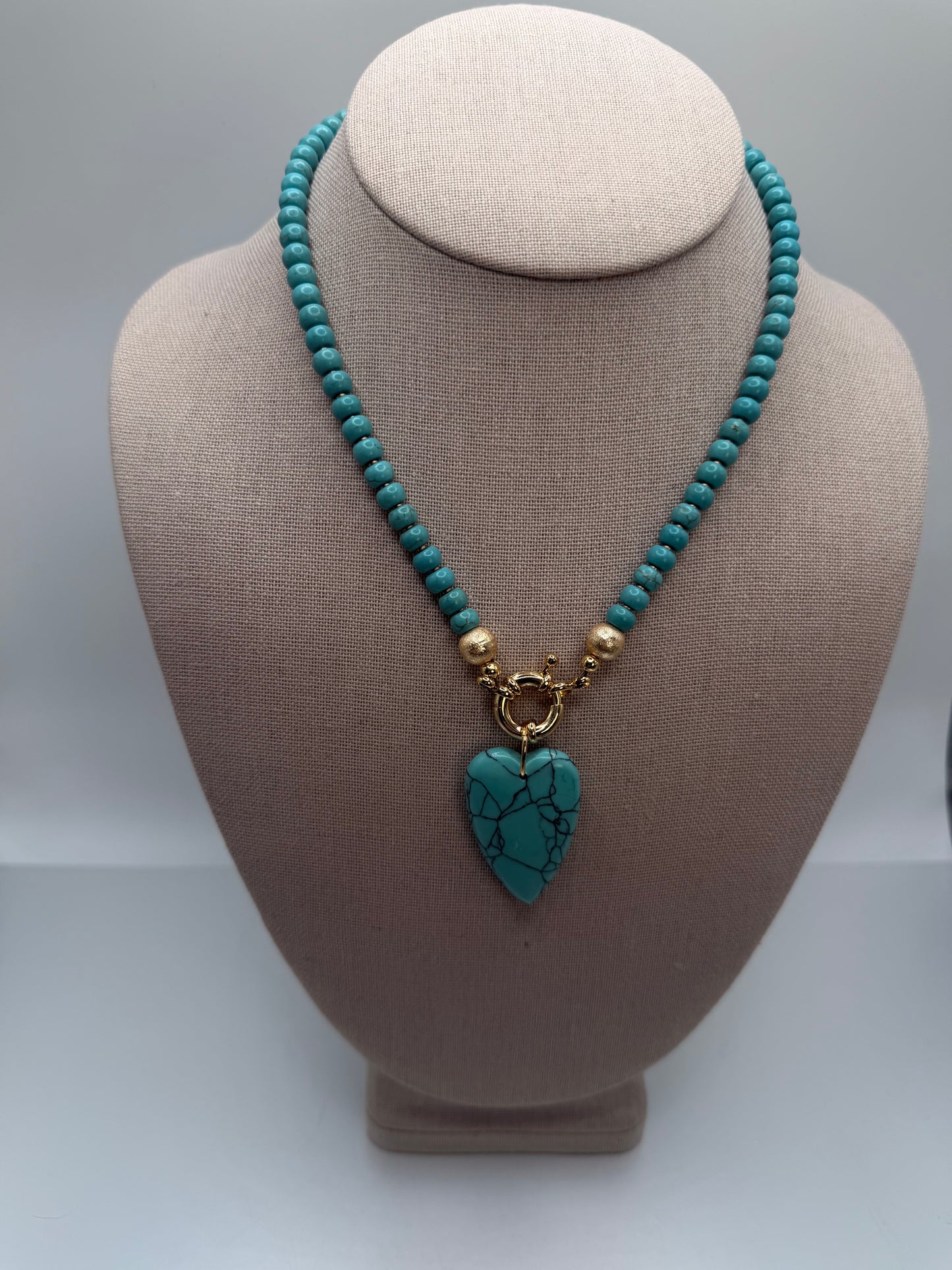 Flock: turquoise with heart pendant