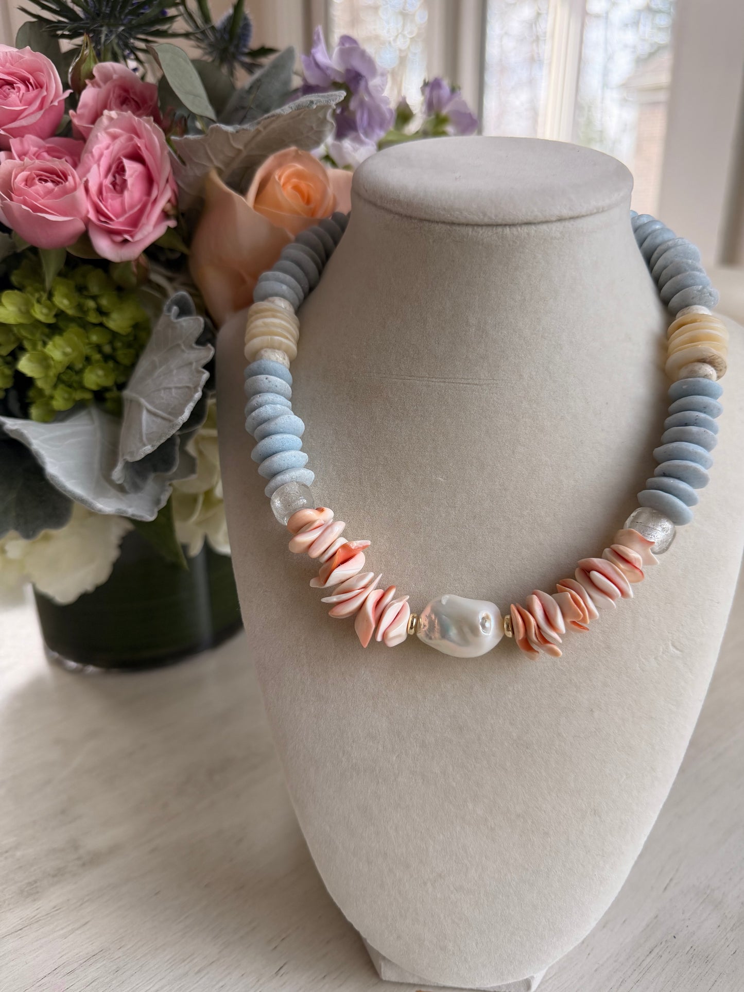 Beachy shells with light blue glass beads and a baroque pearl