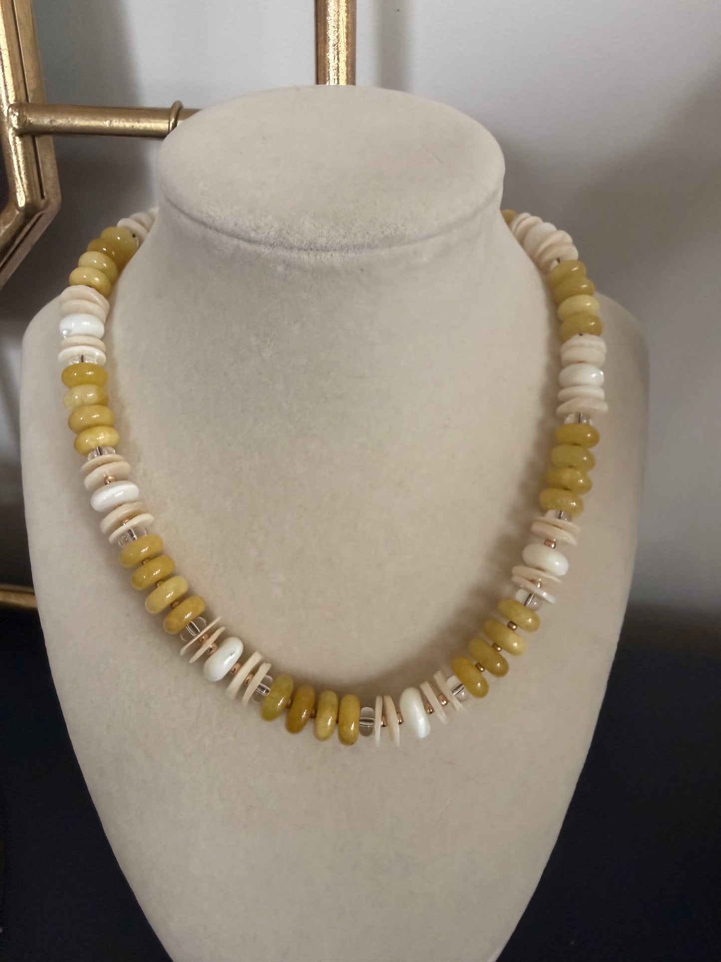 Flock: yellow, shells and mother of pearl