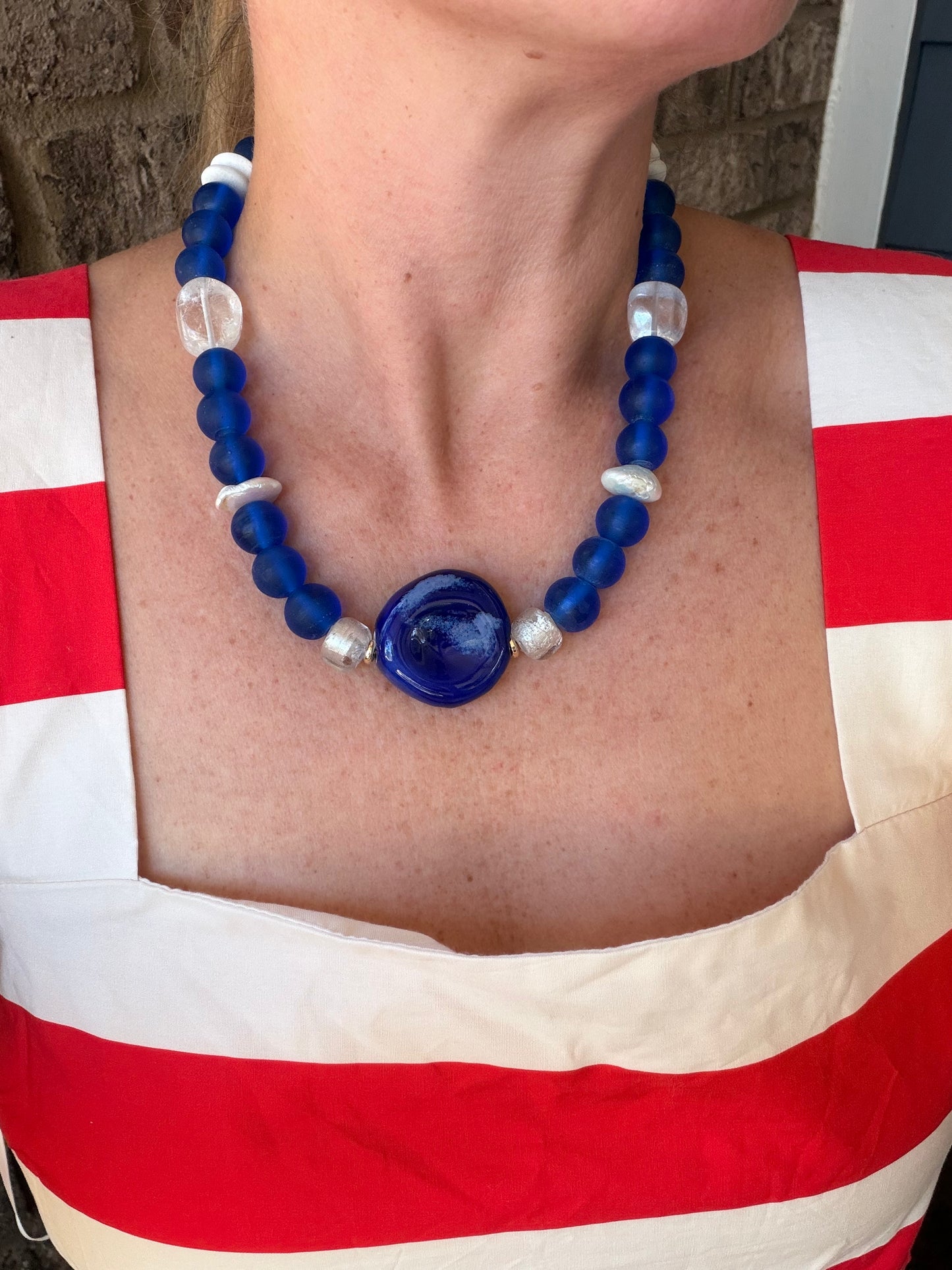 American: blue, clear, and white with blue center stone